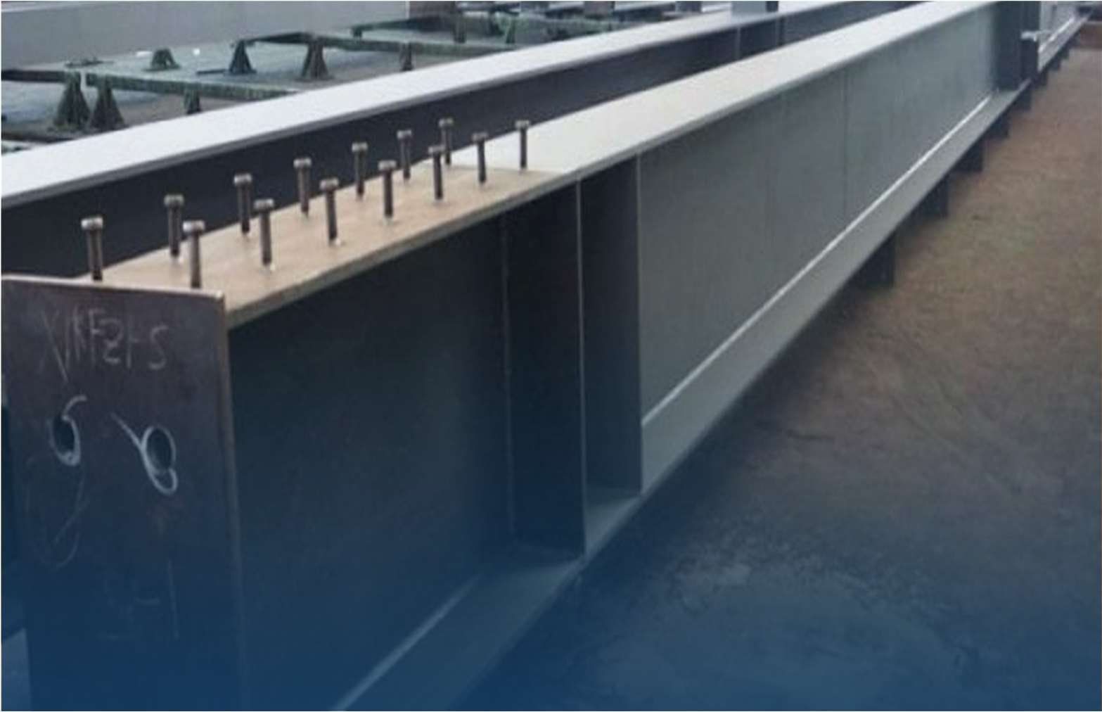 Painted built-up beam with shear studs