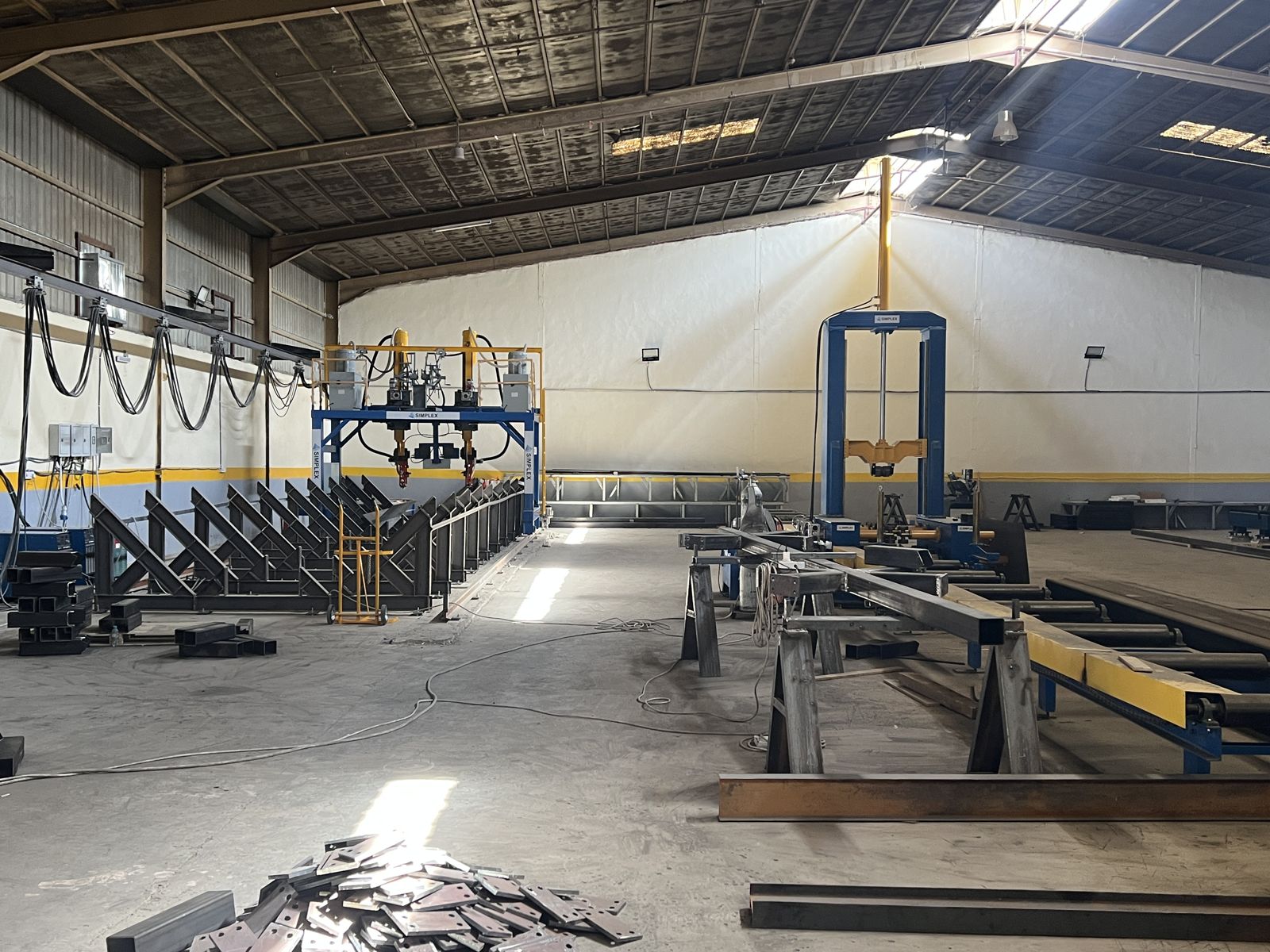 Fabrication hall with built-up section lines